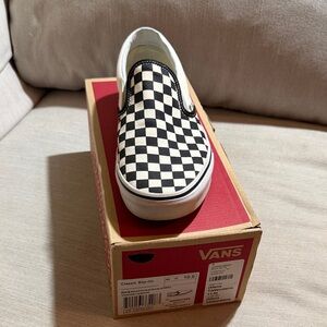 Vans Black and White Checkerboard Slip-Ons